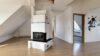 Dachgeschoss mit Studioflair, Kamin und extravagantem Schnitt - Wohnbereich